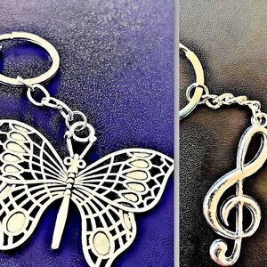 *30off3*NWOT. Beautiful Silver Tone Butterfly & Music Sign Makes a Perfect Gift!
